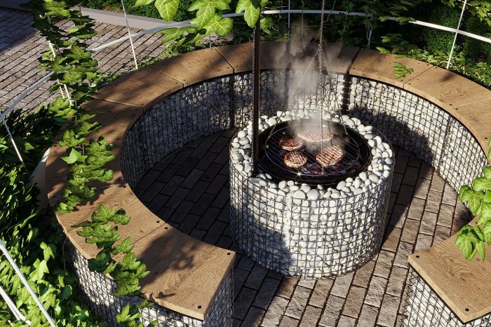 Round gabion-walled fire pit with timber benches — Site Drainage: Keeping Water Away from the House