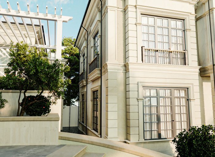 Close-up of a neoclassical facade with window surrounds and stone cornices — Facade Decor: Materials for Cornices, Columns and Surrounds